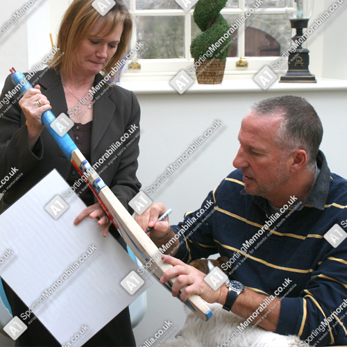 Sir Ian Botham signing Cricket Bat for A1 Sporting Memorabilia Sir Ian Botham signing Cricket Bat for A1 Sporting Memorabilia