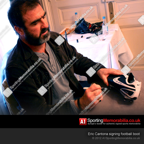 Eric Cantona signing football boot Eric Cantona signing football boot