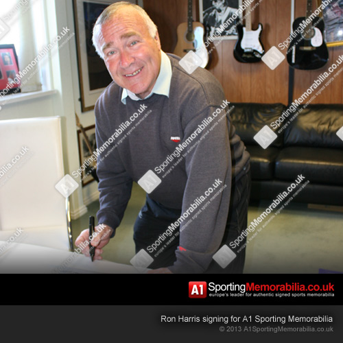 Ron Harris signing for A1 Sporting Memorabilia